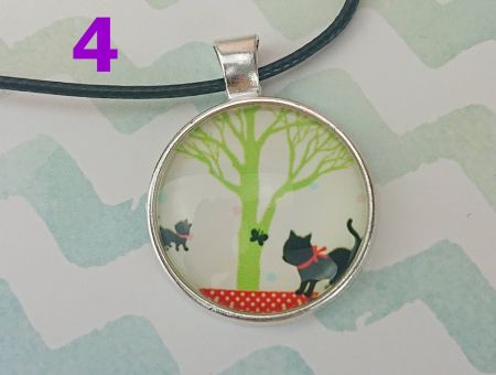 Кулон КІТ сріблястий №0013 , 25мм, з чорним шнурком