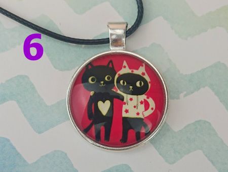 Кулон КІТ сріблястий №0013 , 25мм, з чорним шнурком