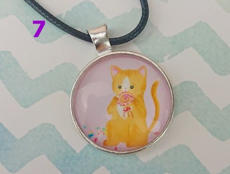 Кулон КІТ сріблястий №0013 , 25мм, з чорним шнурком