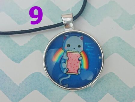 Кулон КІТ сріблястий №0013 , 25мм, з чорним шнурком